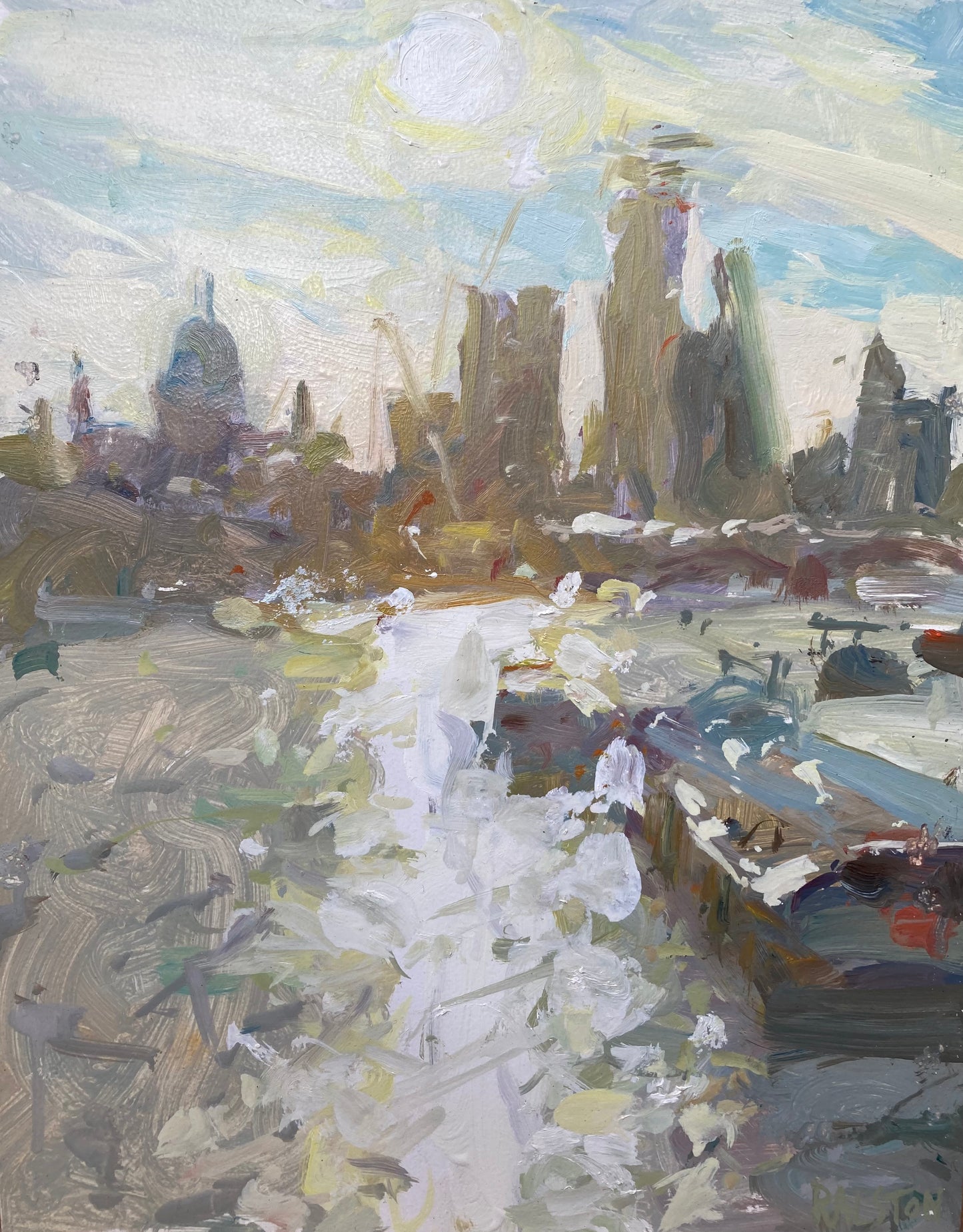 Saint Paul’s and London with barge on the Thames and water sparkle