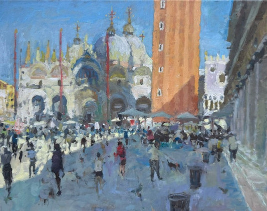 Painting of a bustling city street with architectural landmarks and people in St.Mark’s Square in Venice. A shadow is cast with the Campanile Tower and pigeons in the square 