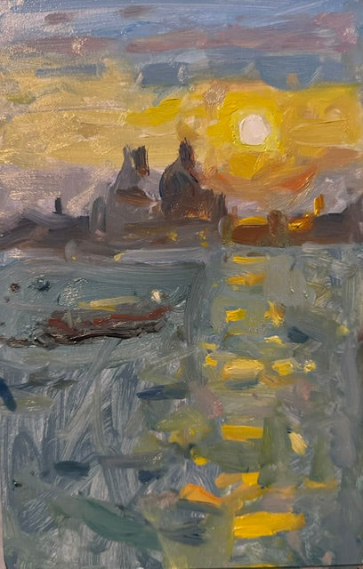Sunset painting over the grand canal in Venice. Sparkle on the water with the salute in the distance
