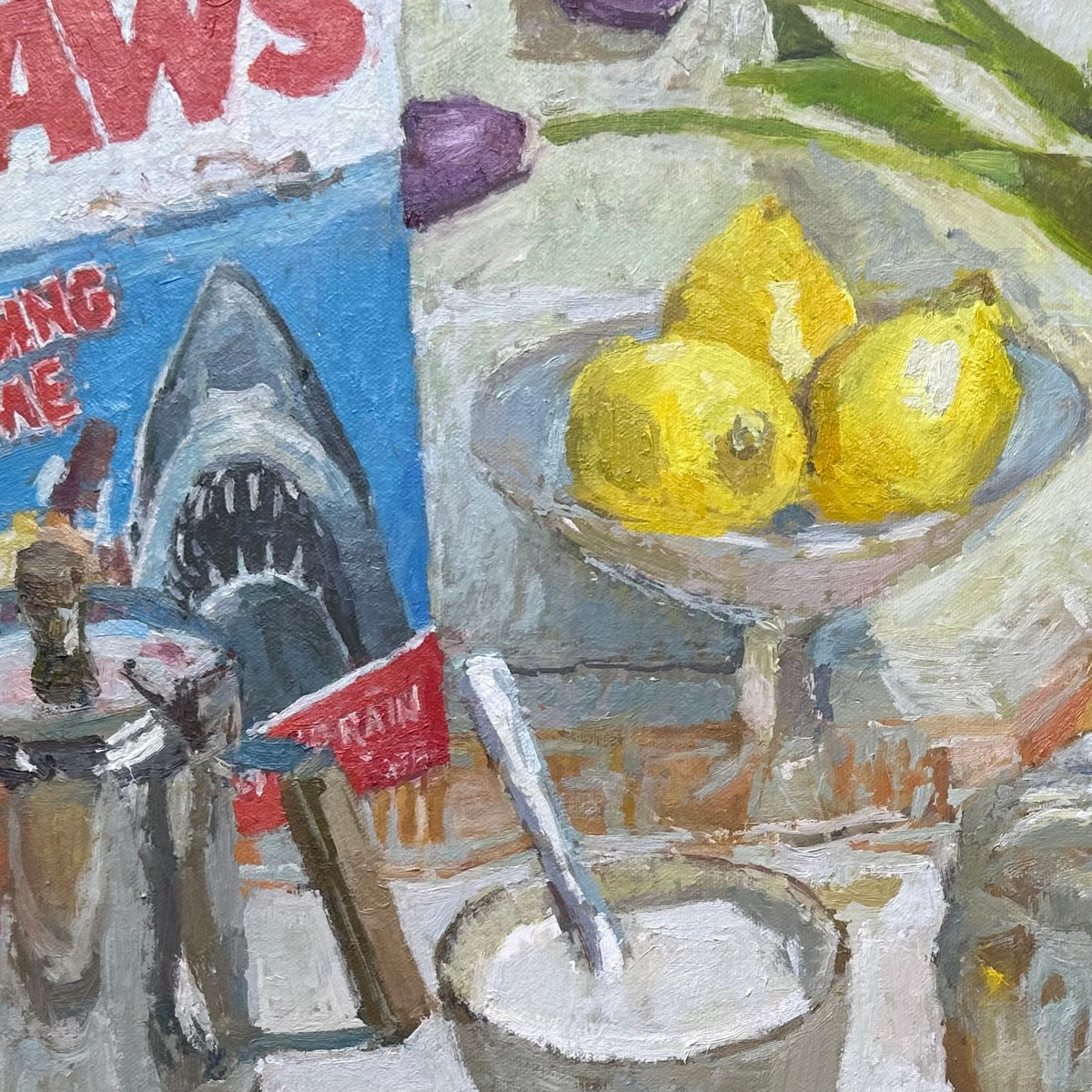 An expressive oil painting still life featuring lemons in a glass bowl, a spoon in a cup of white liquid, a blue sign with a jaws shark cereal box illustration, and other painted objects with visible brushstrokes