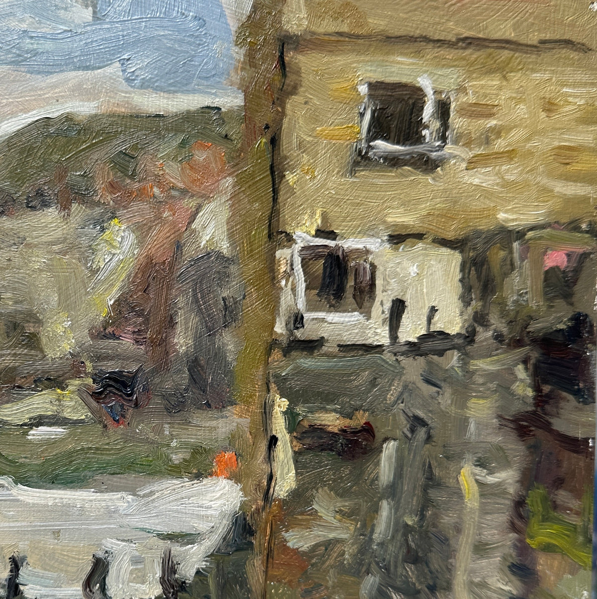 Impressionism oil painting of a building facade in Staithes with textured brushstrokes and Penny Nab in the distance