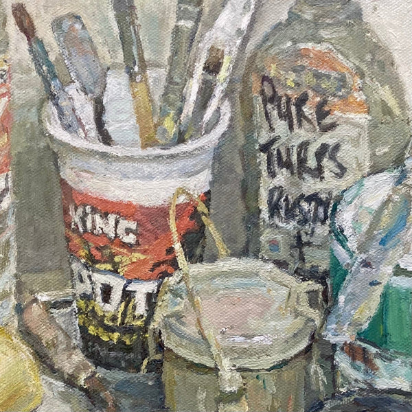 Impressionistic oil painting of artist supplies, featuring a paint cup filled with paintbrushes, a can labeled 'Pure Turkey Rust,' and other paint containers in a textured, painterly style.